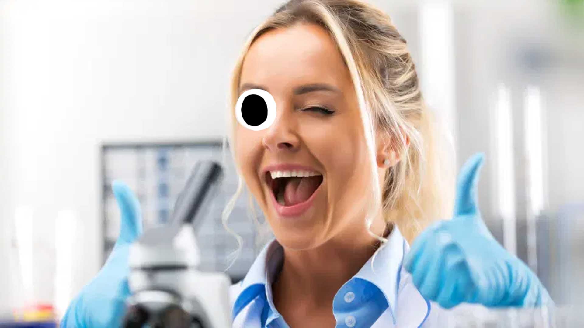 A smiling scientist clearly doing a good job 