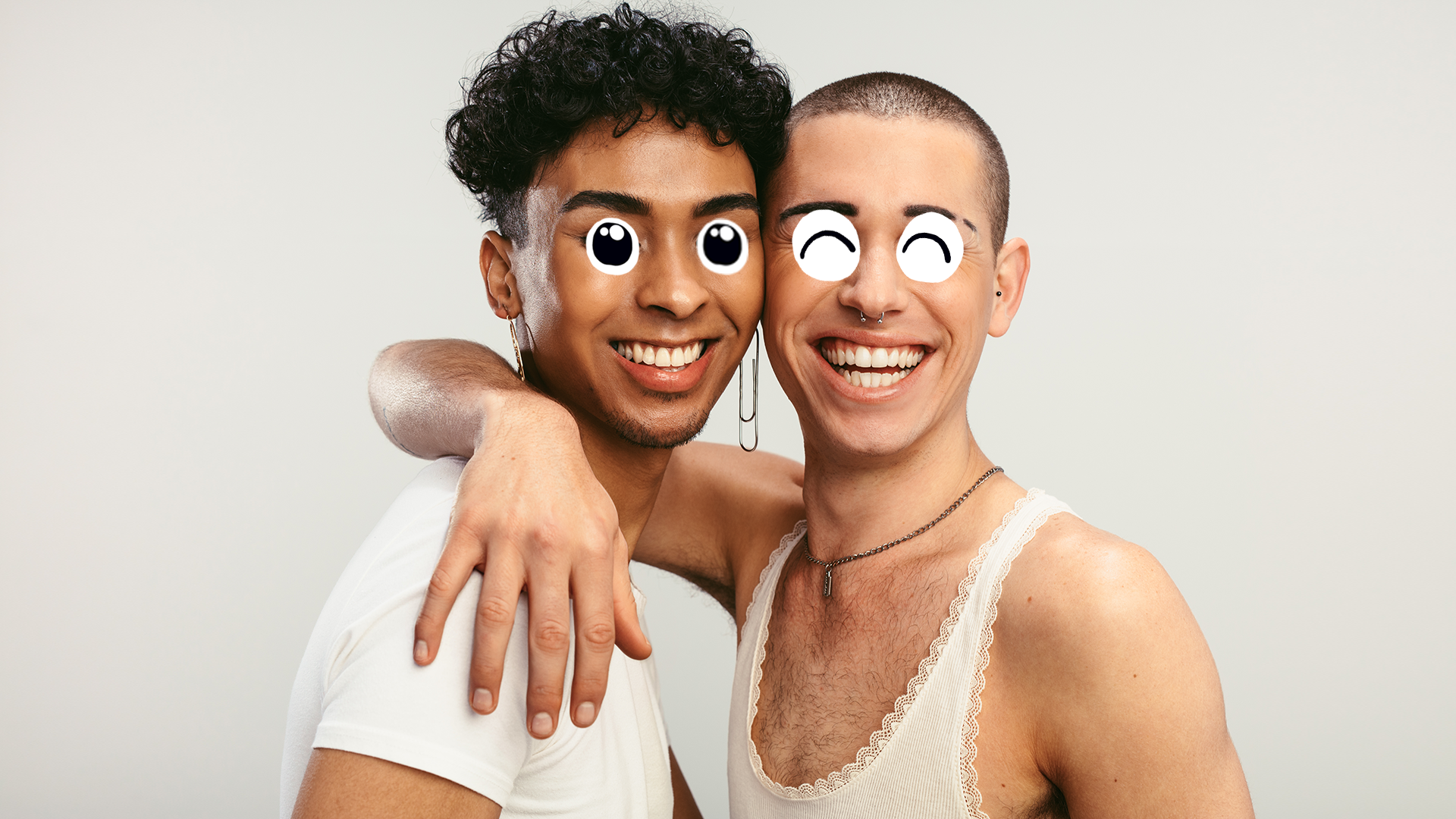 Two partners with googly eyes in a happy and loving embrace