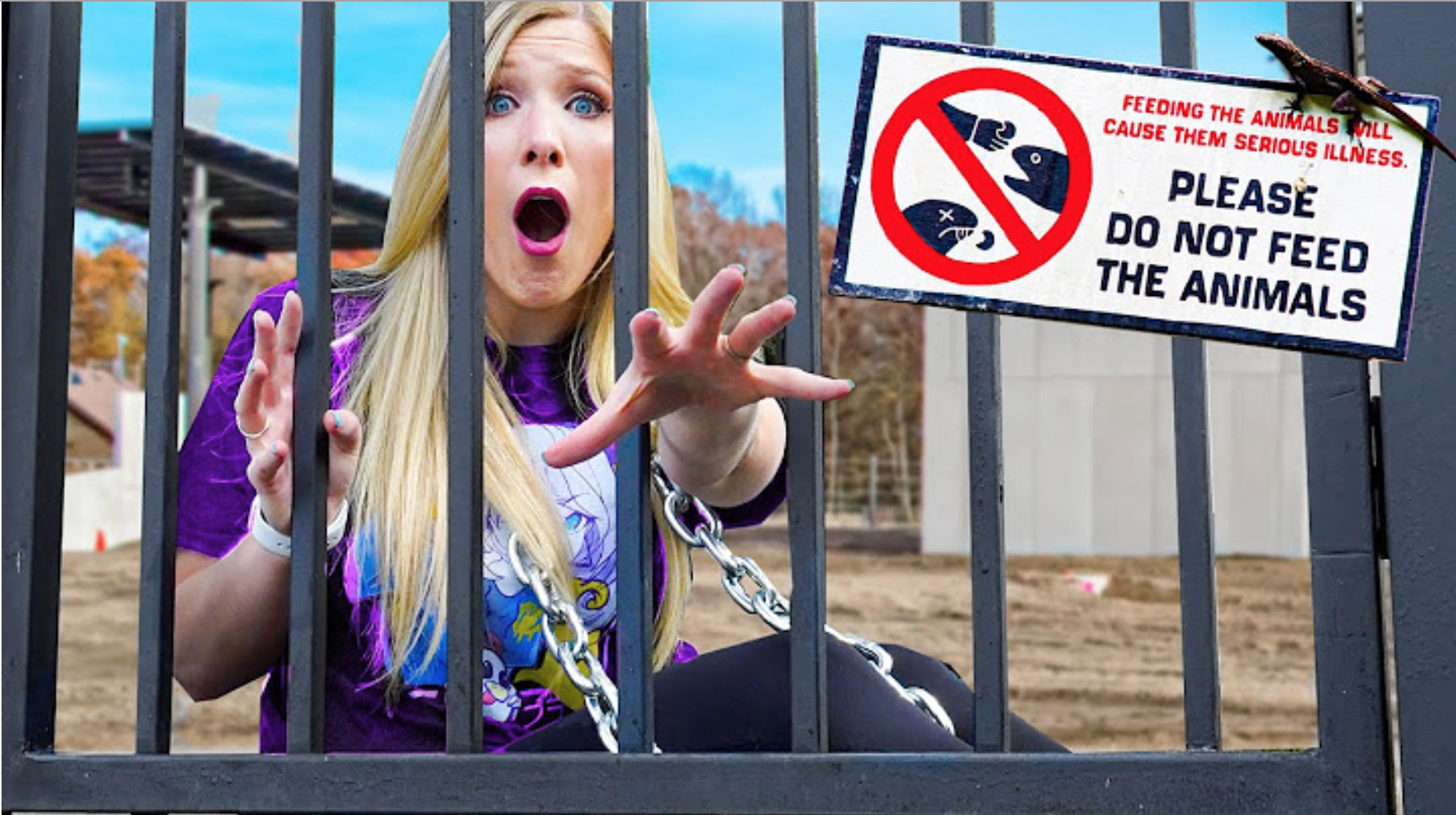 Brianna behind bars with a sign saying 'do not feed the animals'