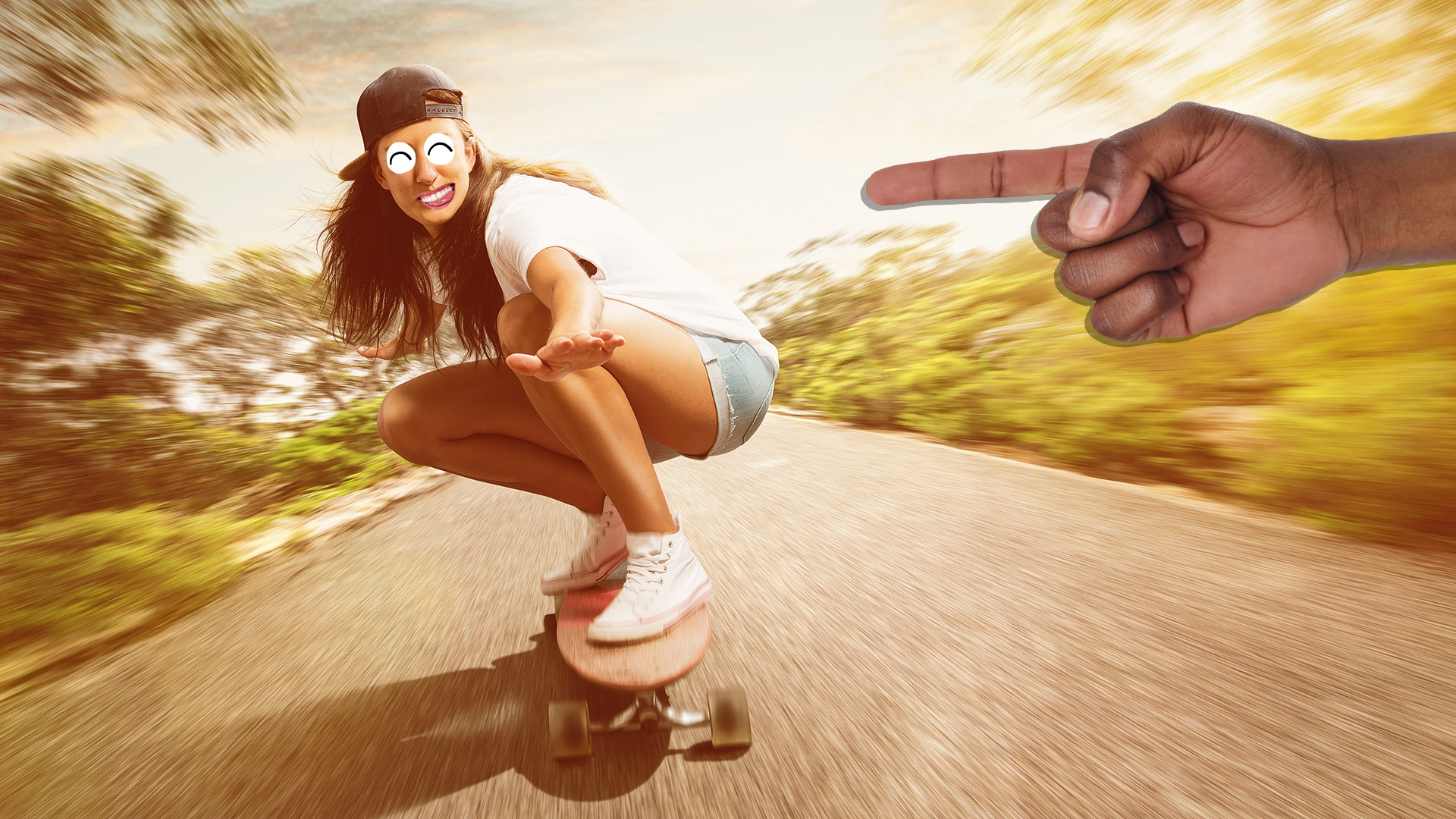 A woman skateboarding down a hill