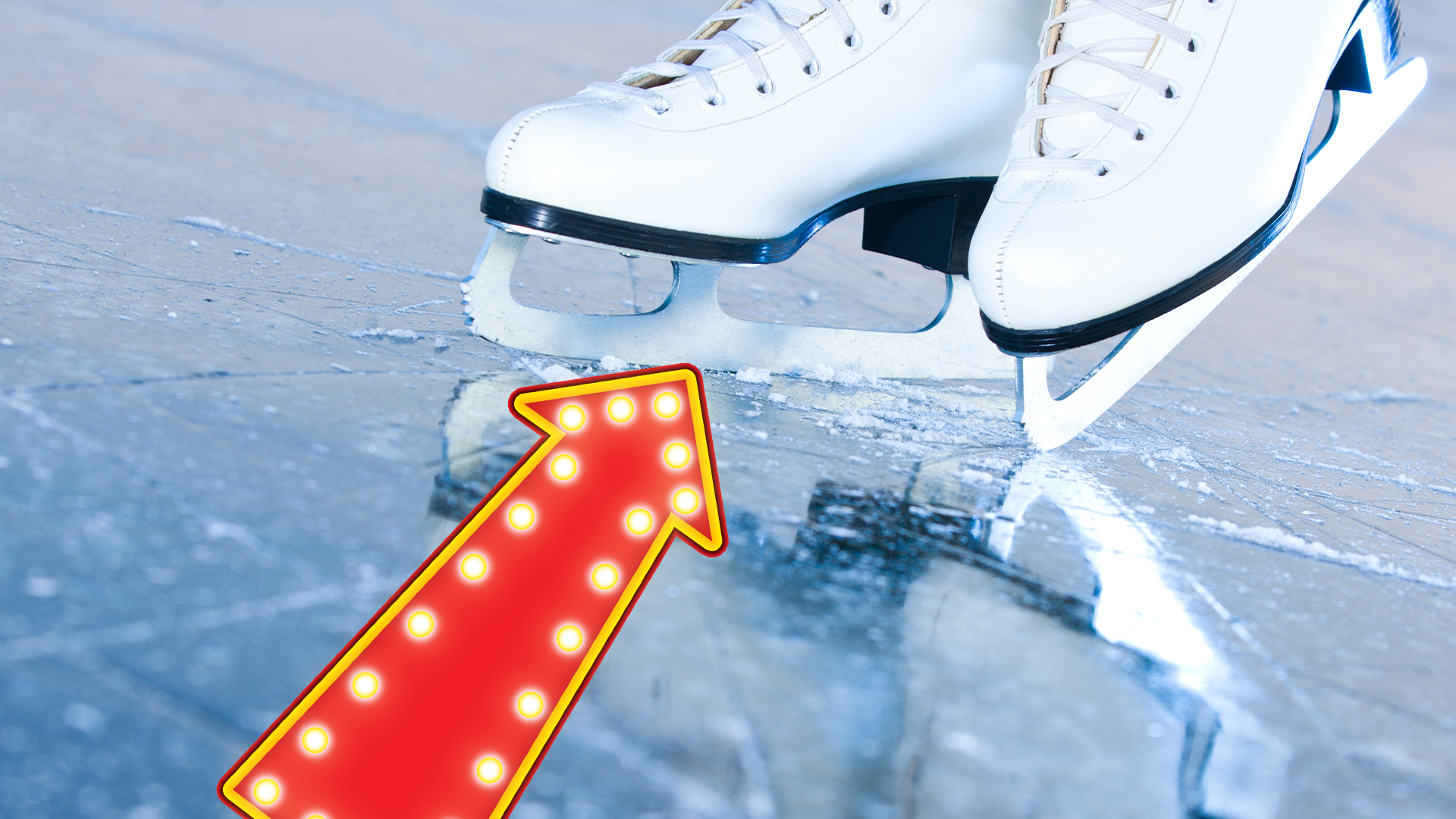 Ice skates on ice and arrow