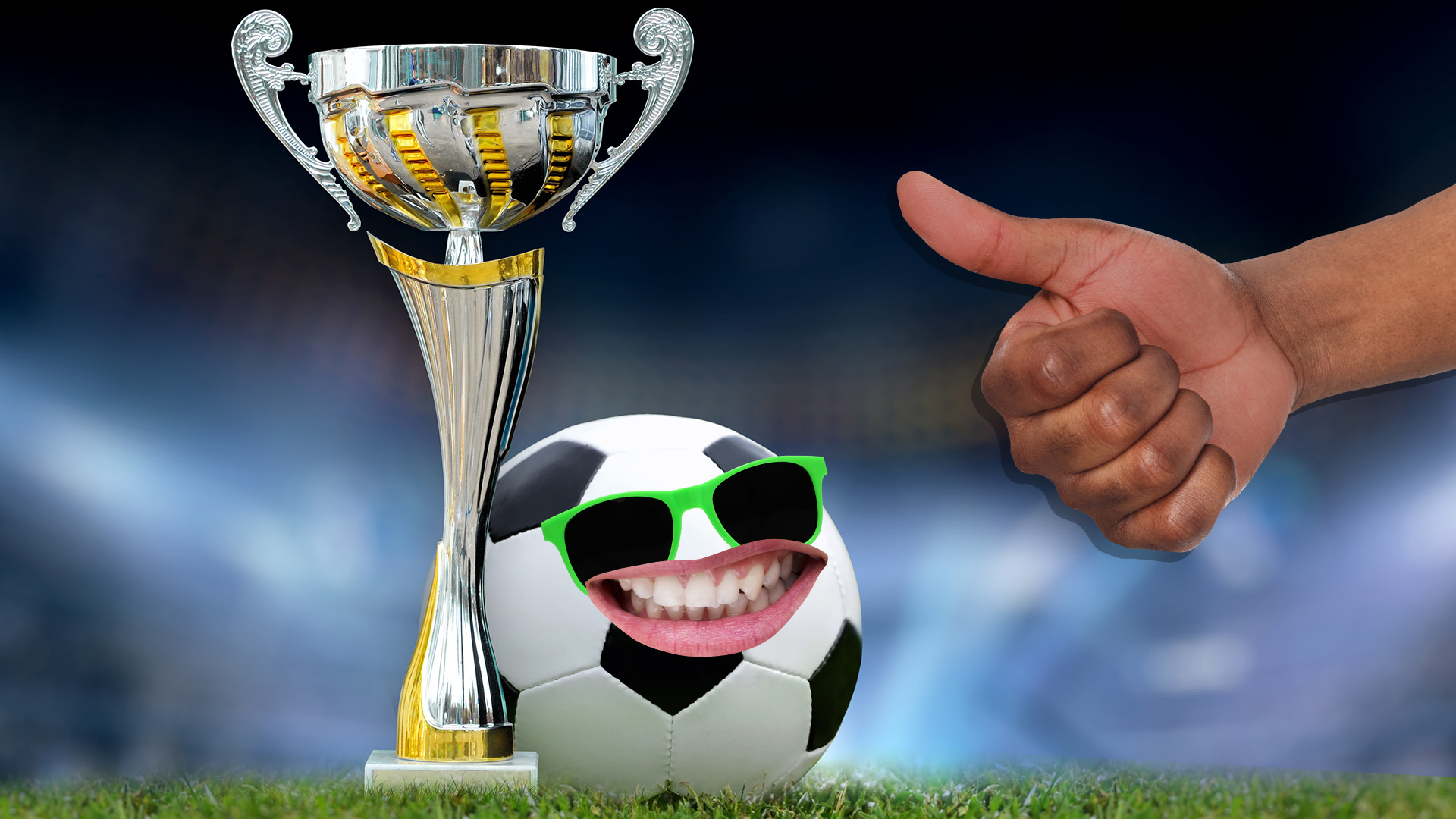 A person giving a thumbs up to a trophy and a football