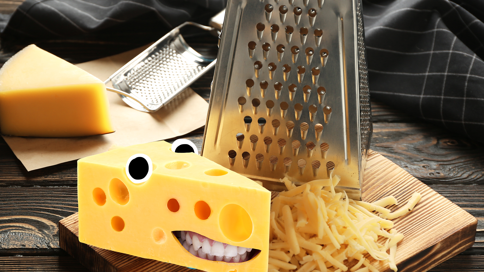 Cheese grater and cheese with goofy face