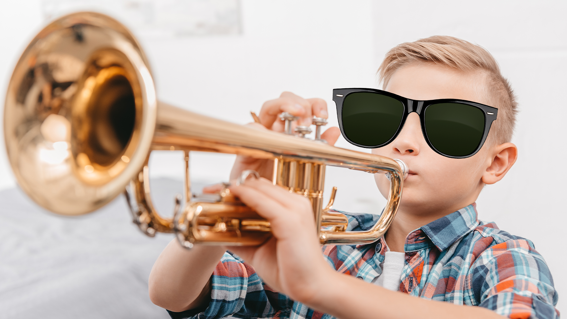 A cool boy playing the trumpet
