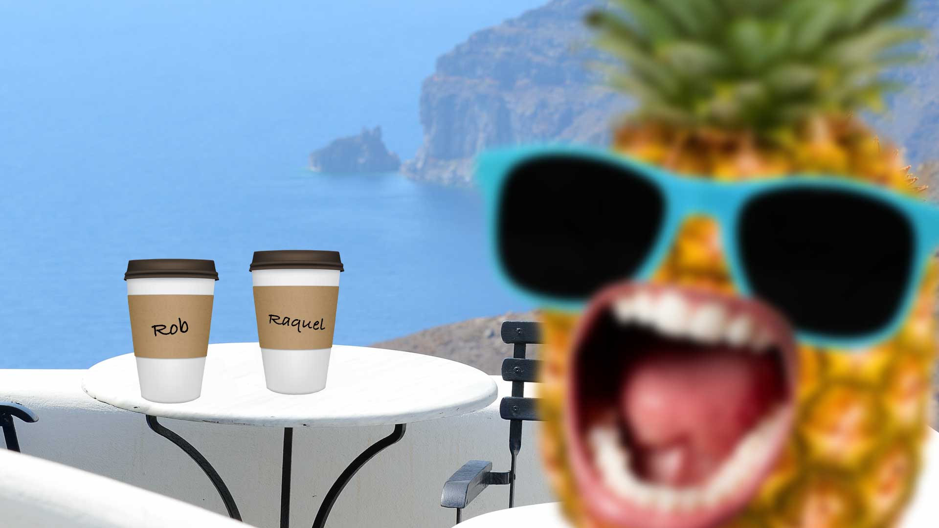 Two coffees in a sunny hillside cafe, with a screaming pineapple in the foreground