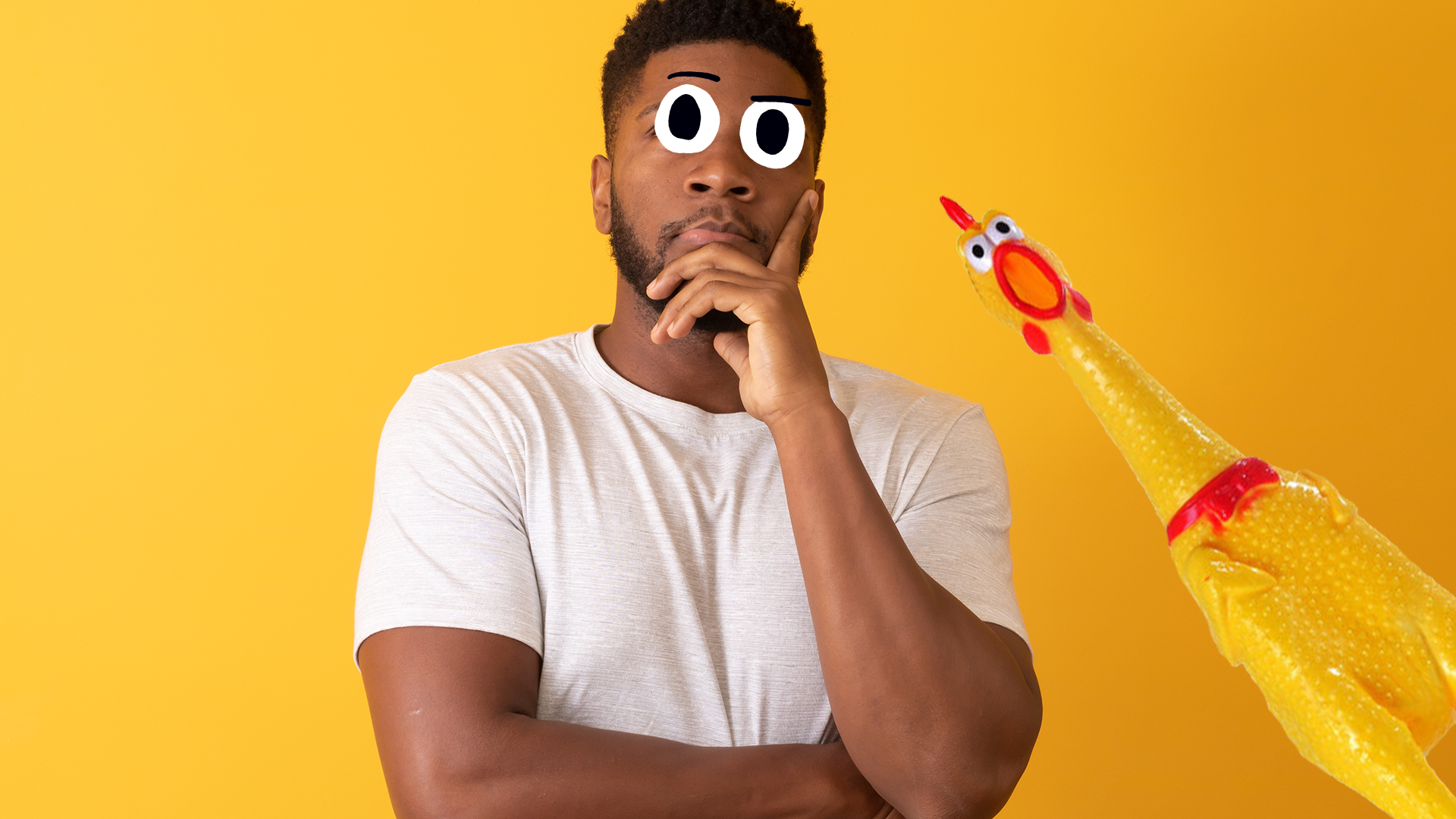Man thinking and rubber chicken