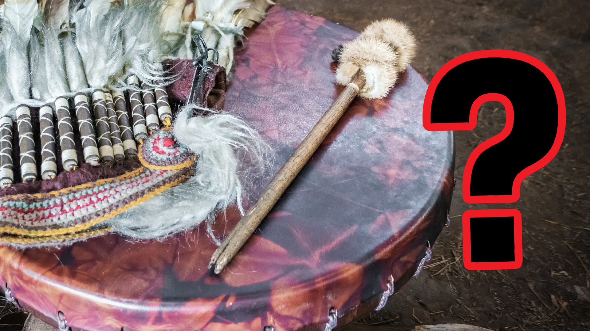 Native American drum and headdress with question mark