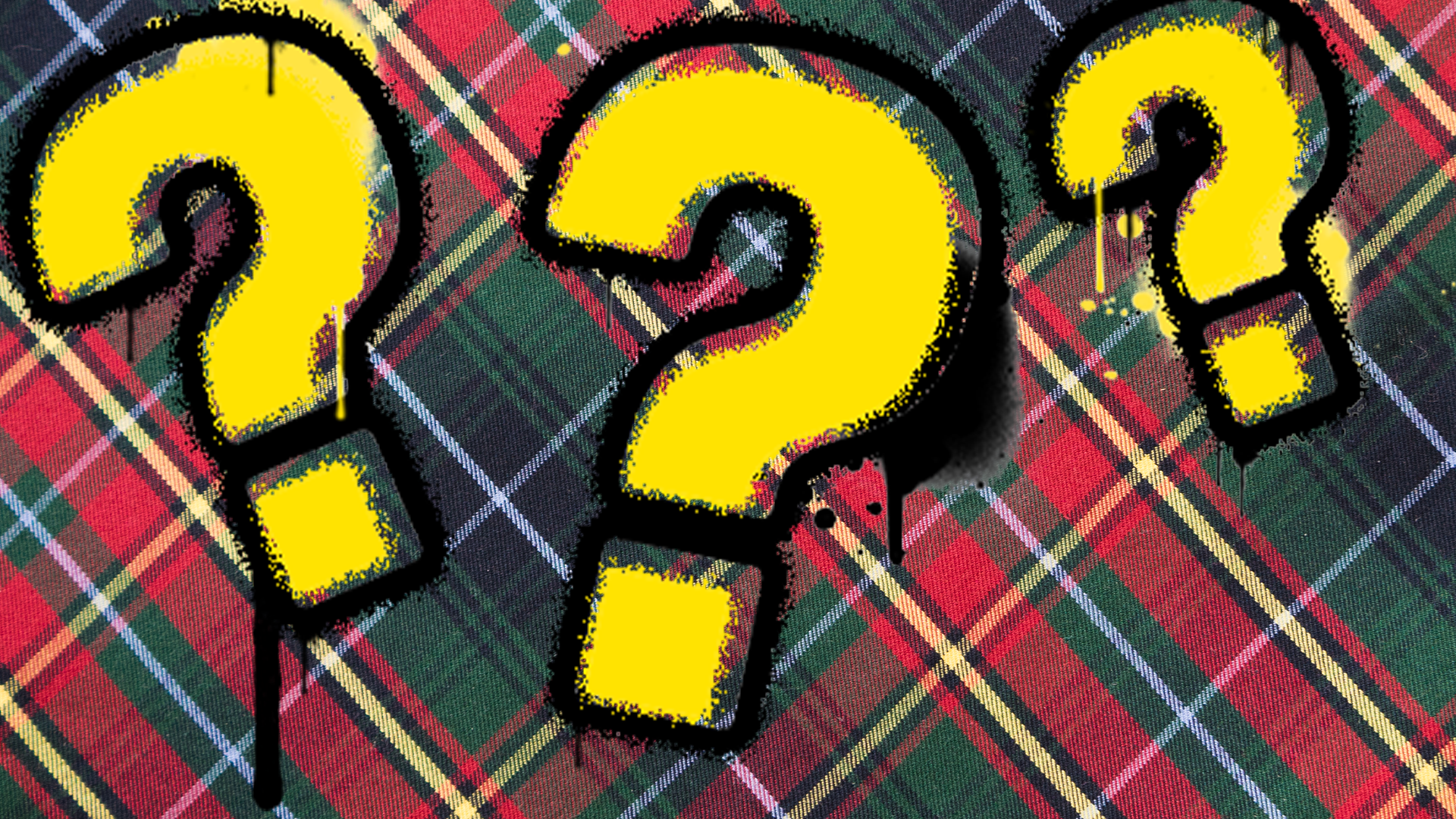Question marks on tartan background