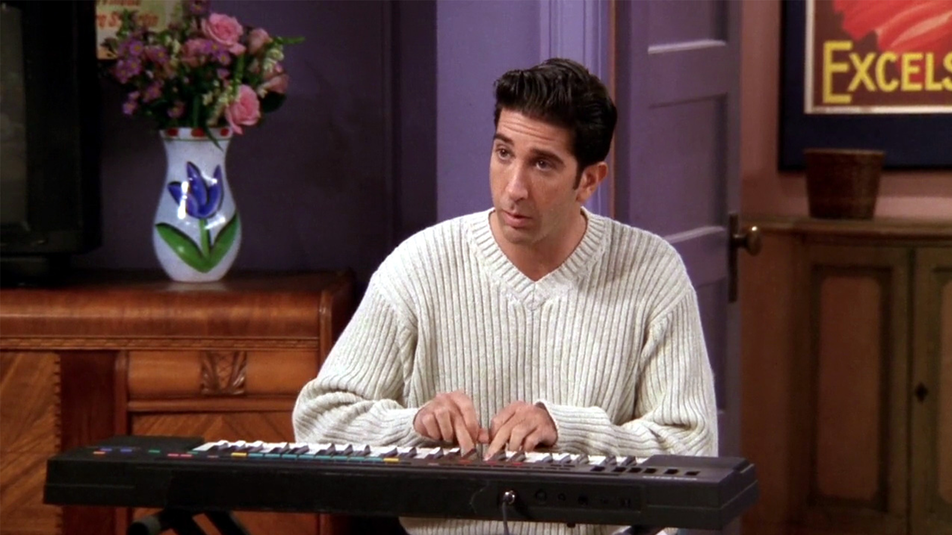Ross playing an instrument in season 4 of Friends