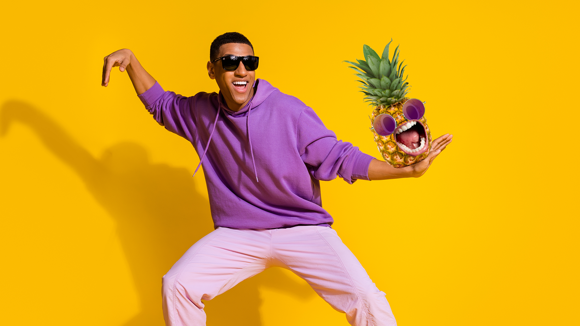 Man and screaming pineapple dancing