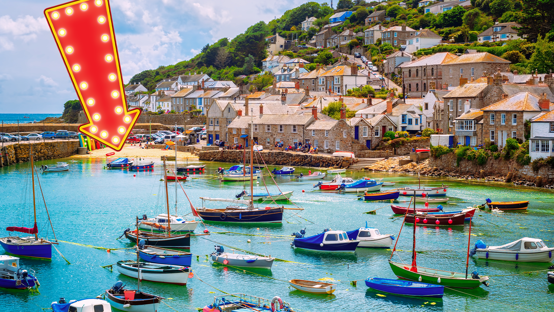 A scenic picture of a Cornish harbour and an arrow