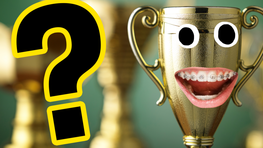 Trophy with face and question mark