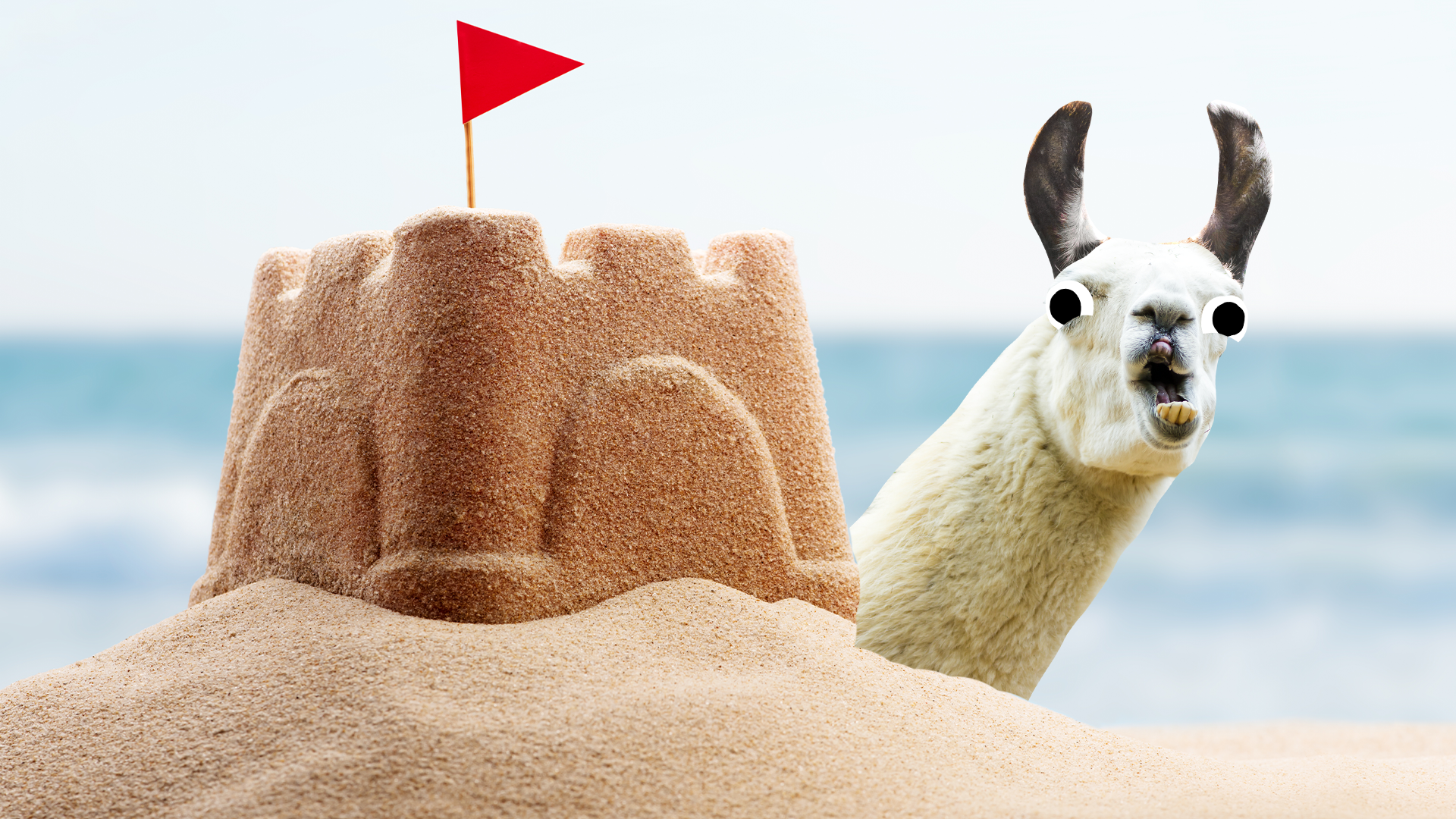 Derpy llama poking out behind sandcastle