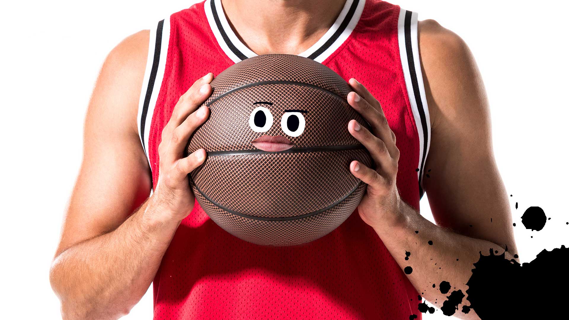 A basketball player holding a ball