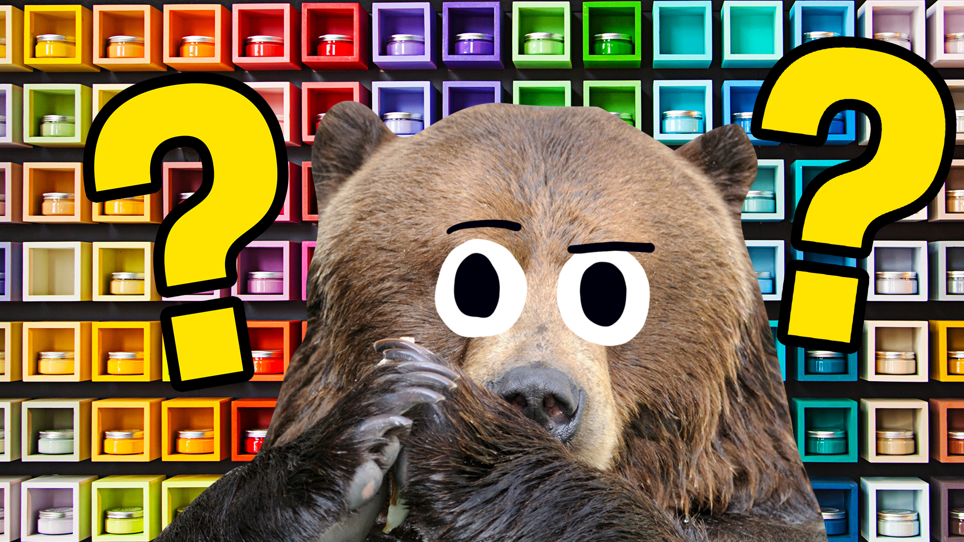 A bear in front of a collection of coloured candles