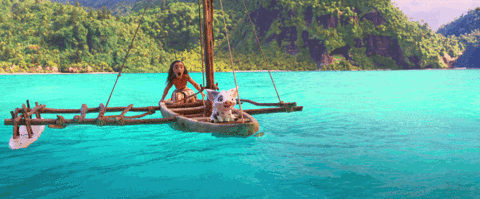 Moana sets off from the island in a boat 