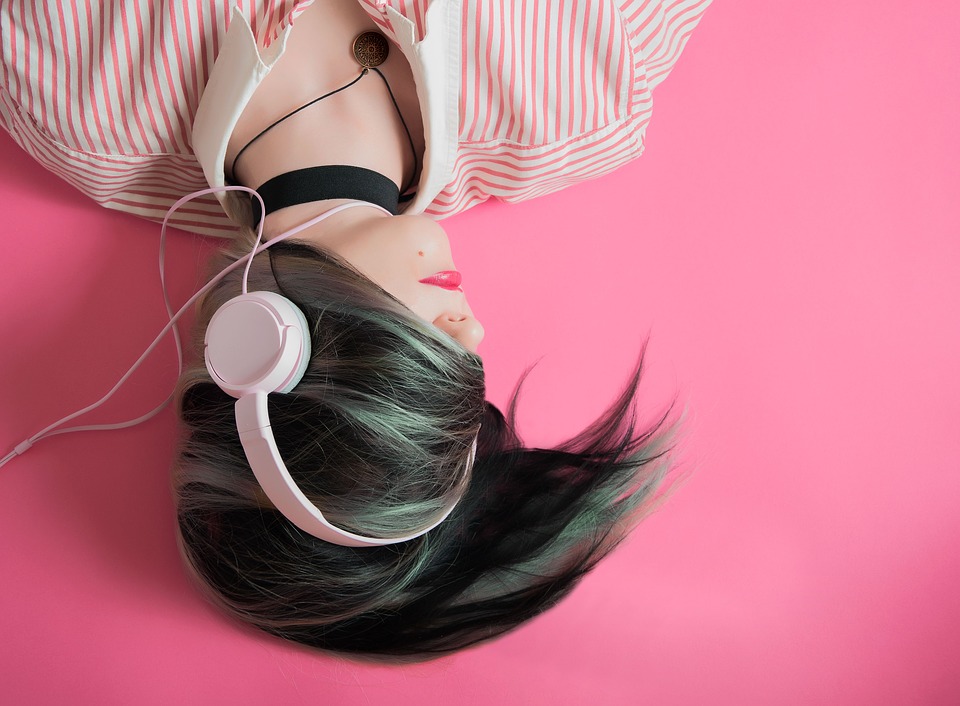 Someone listening to music on headphones