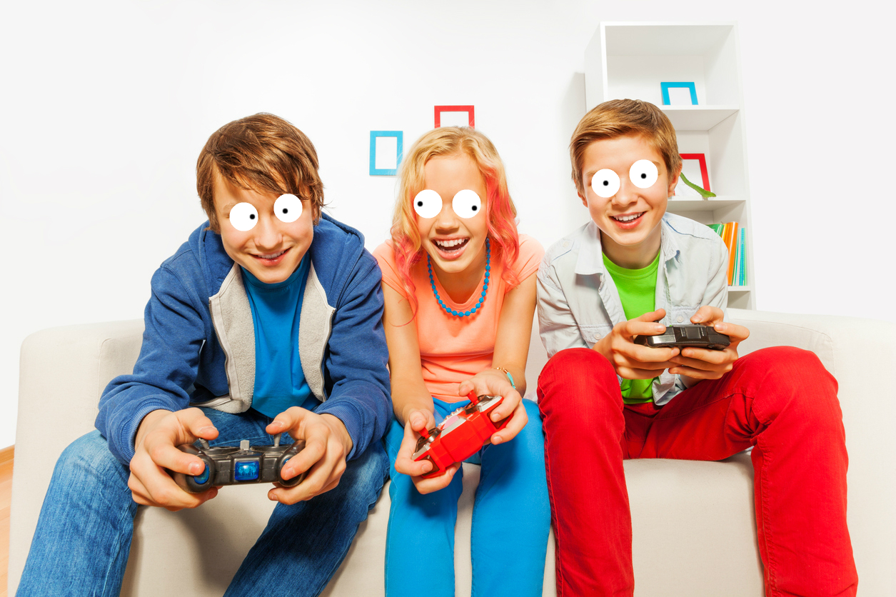 Three children play video games