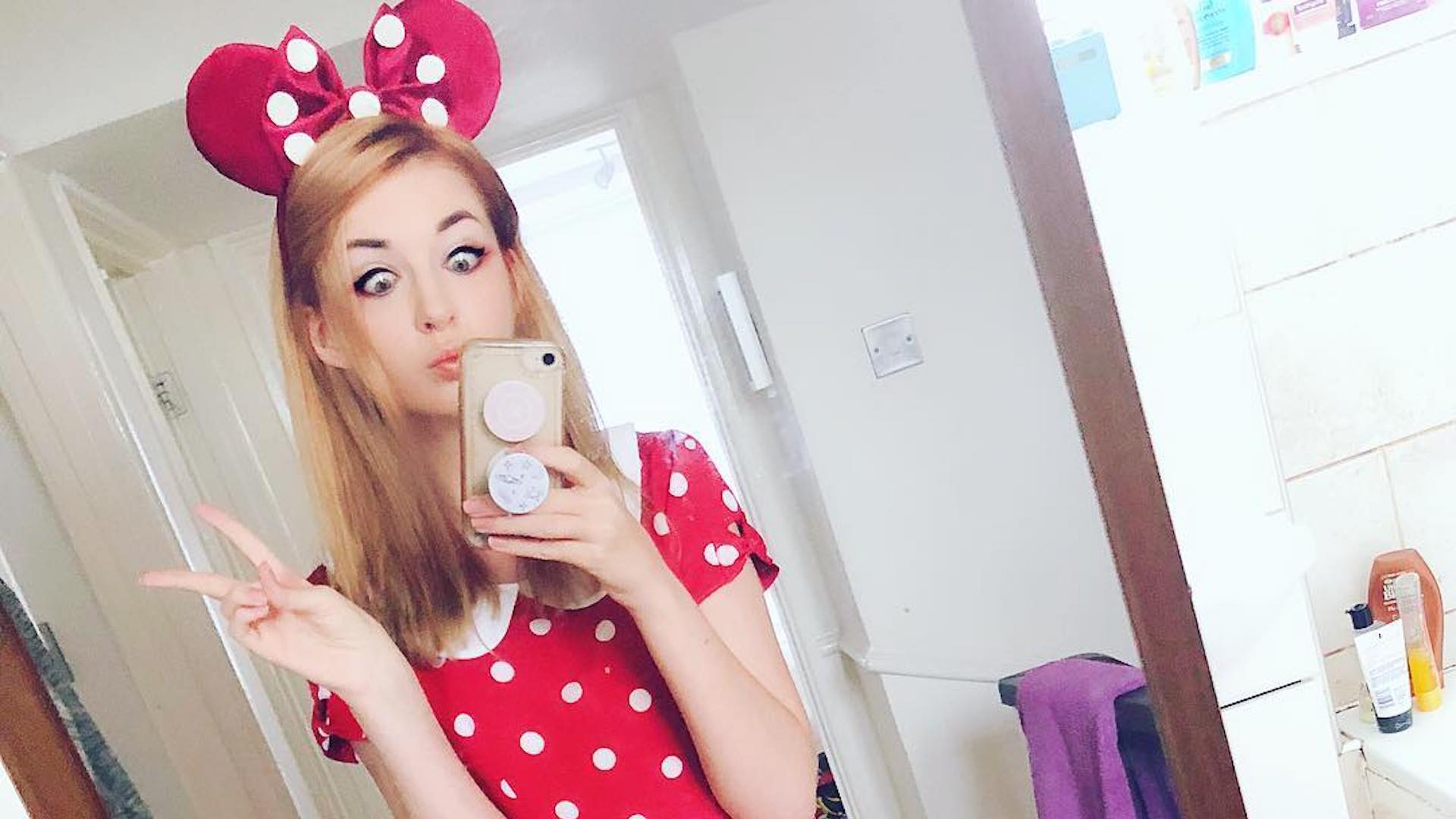 Connie Glynn taking a selfie dressed as Minnie Mouse