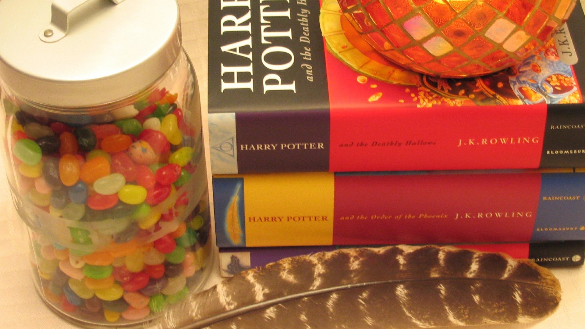 Some of the Harry Potter books, some jelly beans and a feather