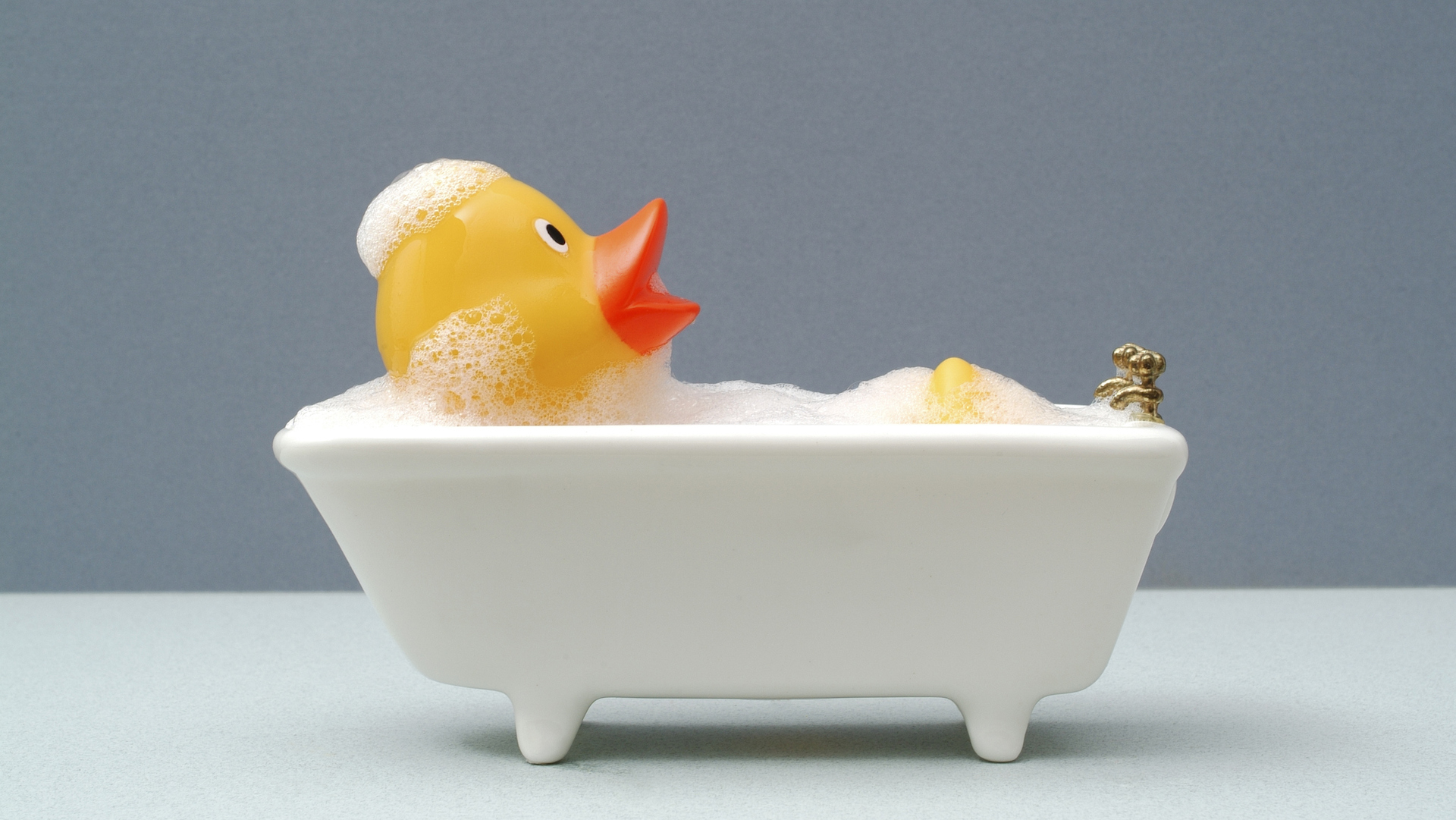 A rubber duck enjoying a bath