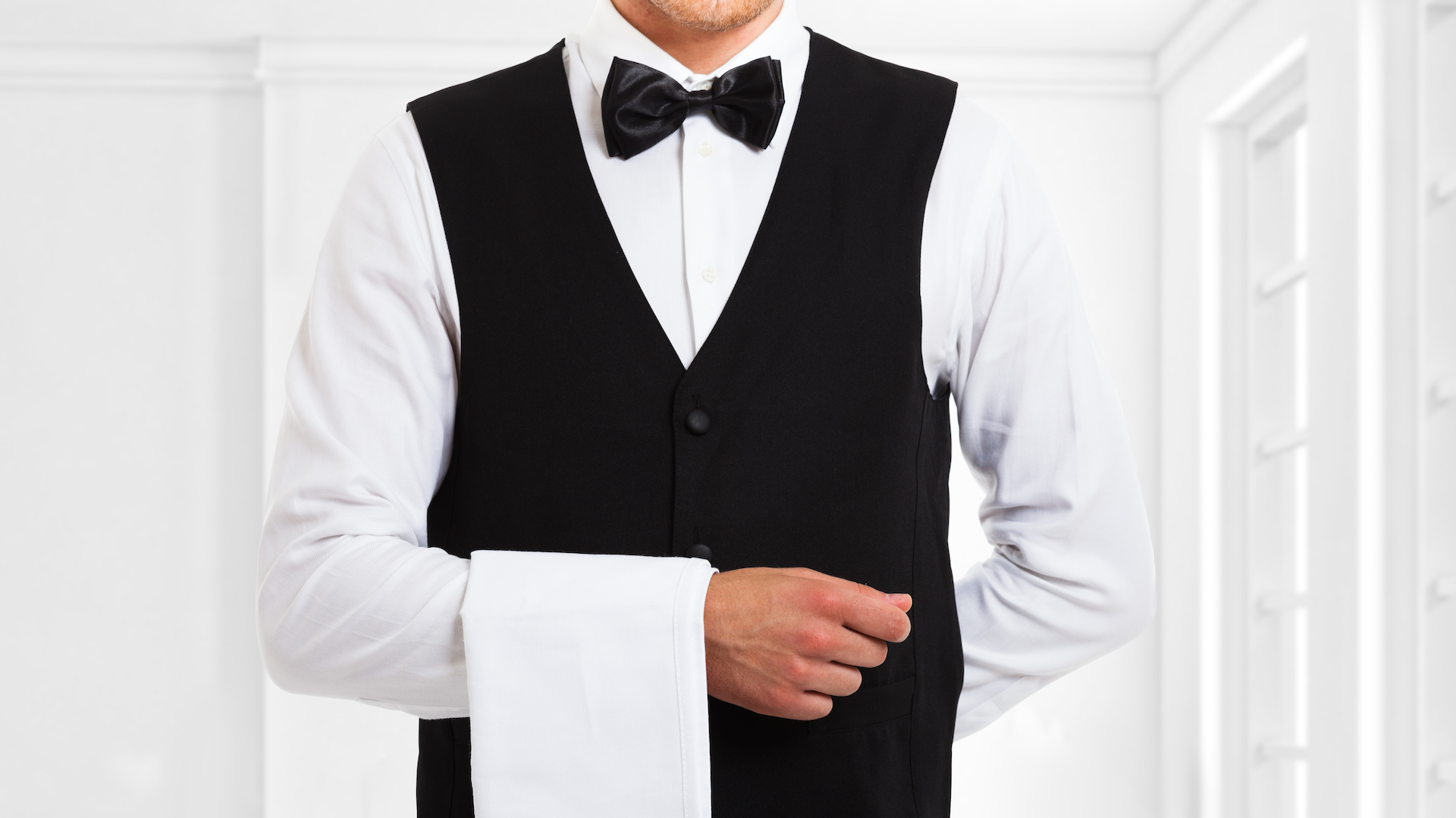 A waiter in a bowtie