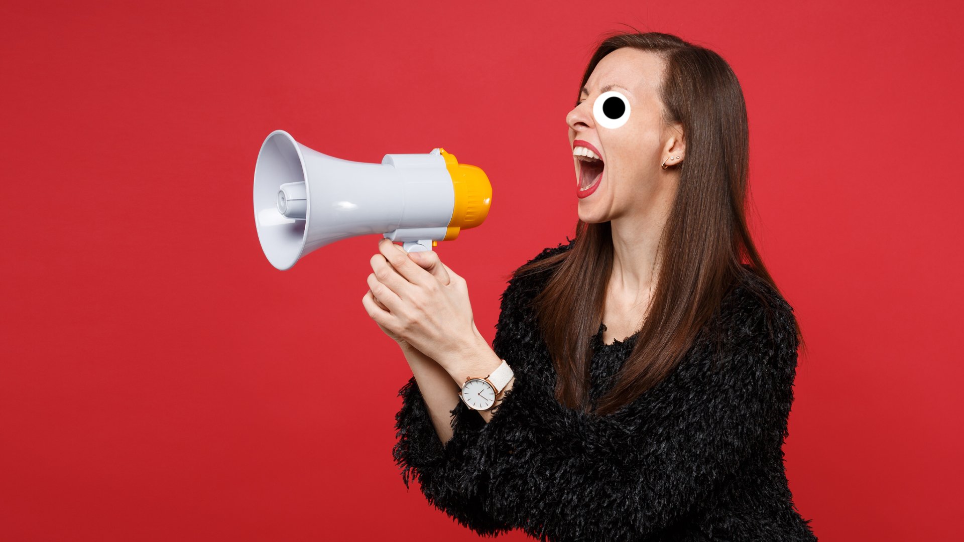 A woman shouting into a megaphone