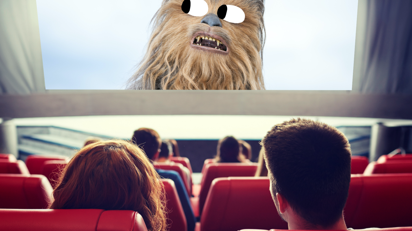 A packed cinema watching Chewbacca on the big screen