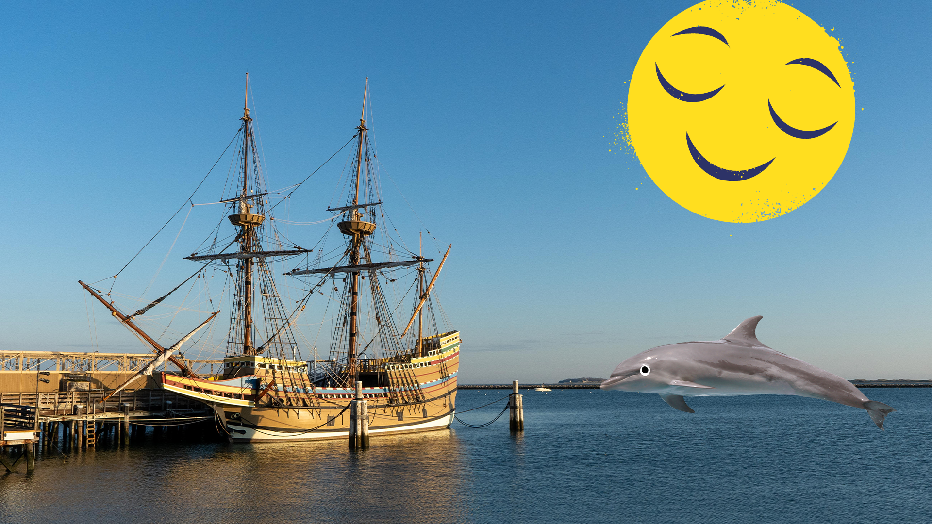 Old ship in bay with Beano dolphin and emoji
