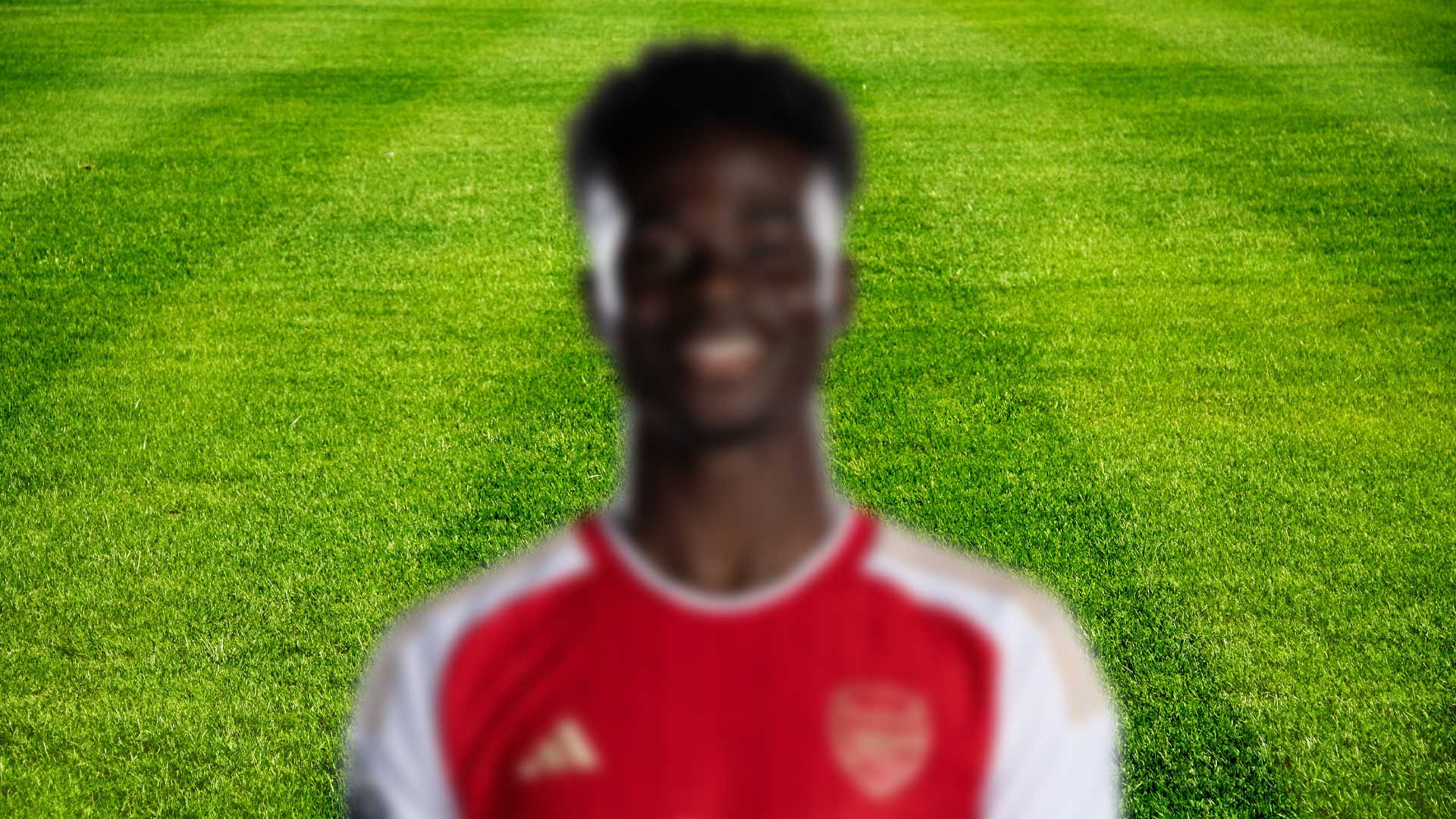A blurred photo of an Arsenal player