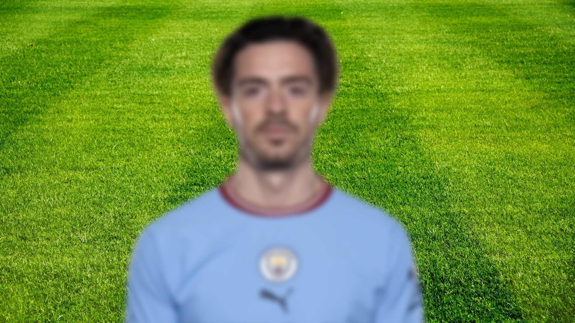 A blurred Manchester City player