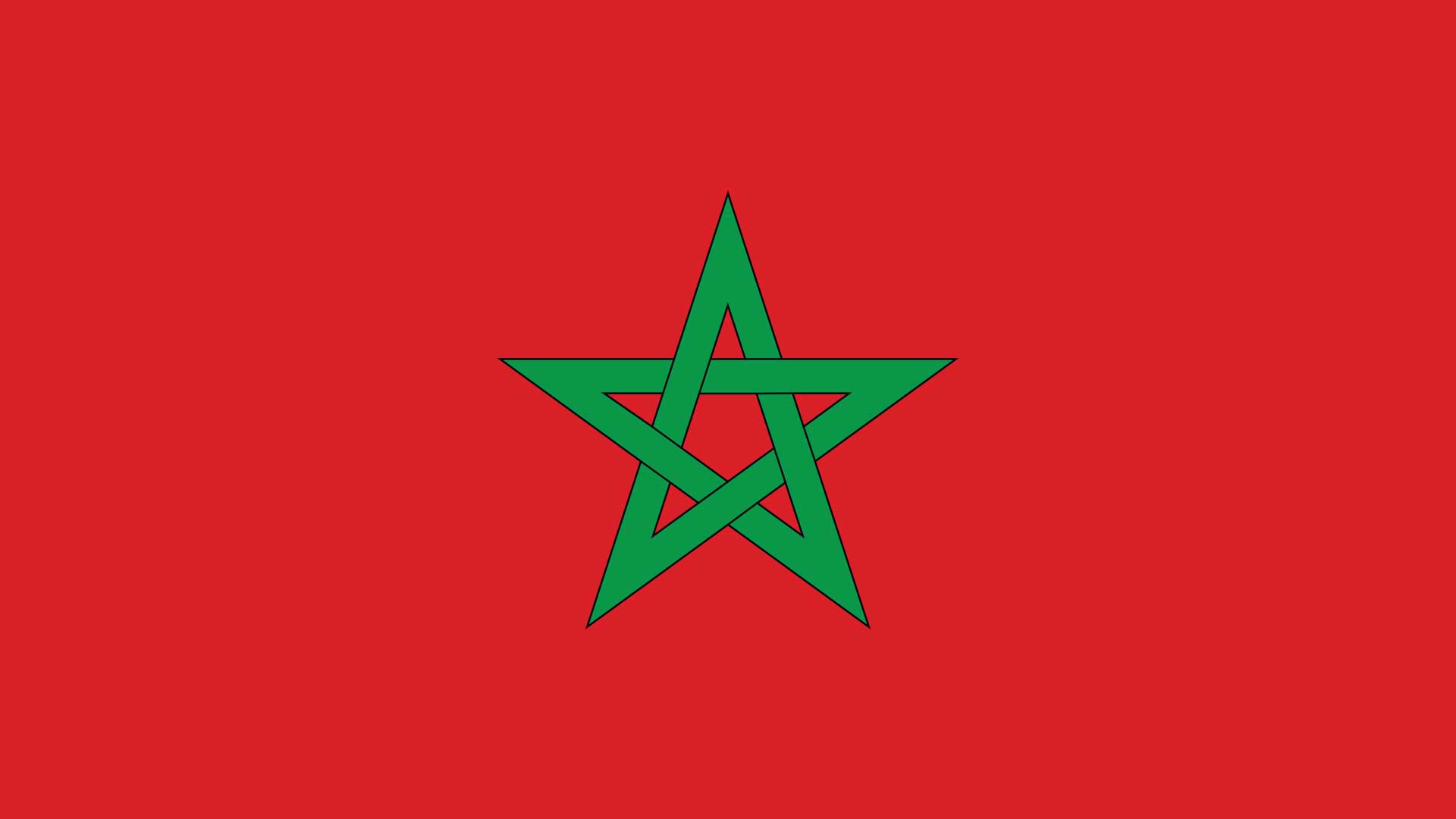 A red flag with a green star shape