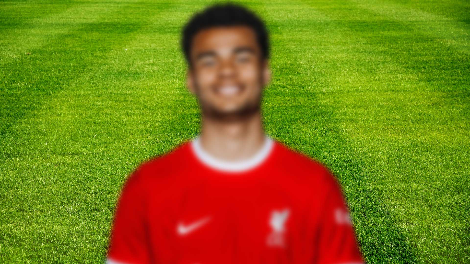 A blurred photo of a Liverpool player