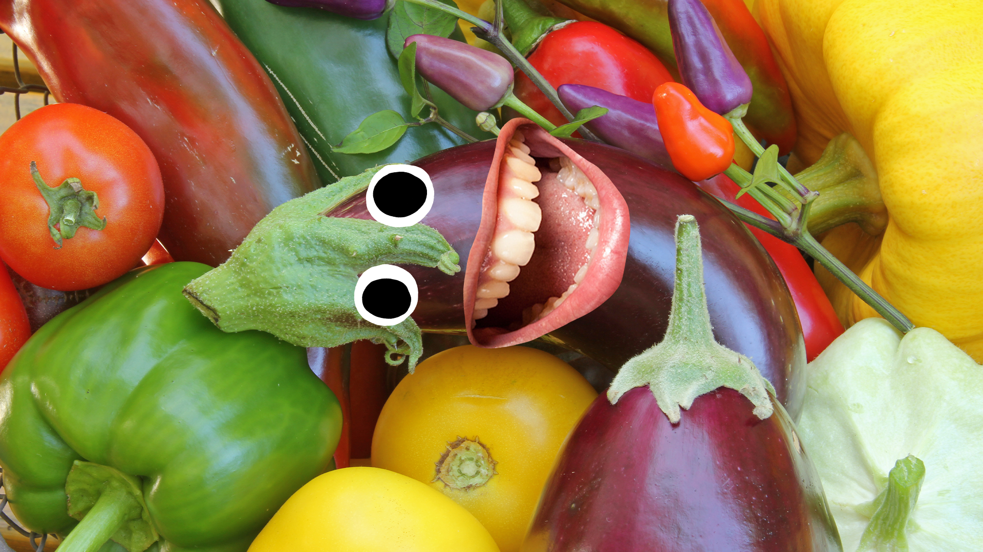 Selection of vegetables, one with goofy face