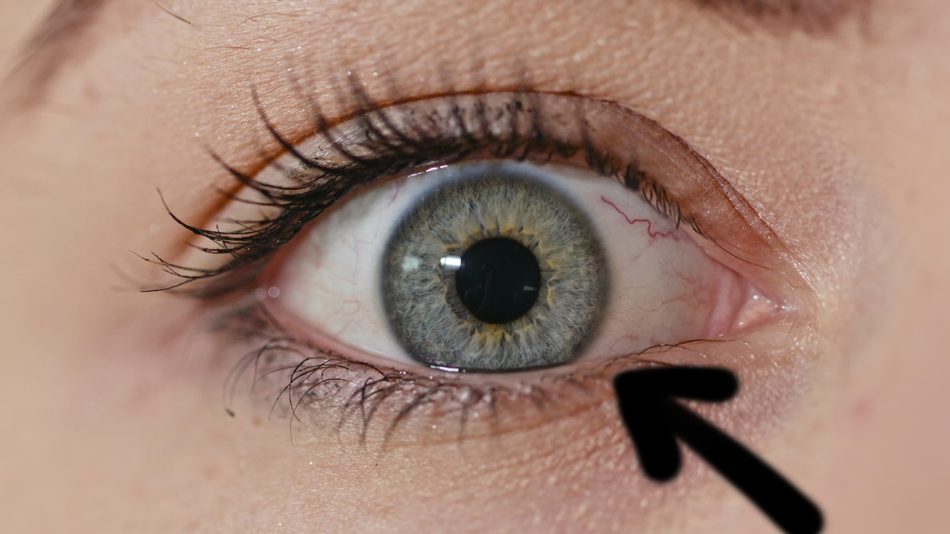 Woman's eye with arrow