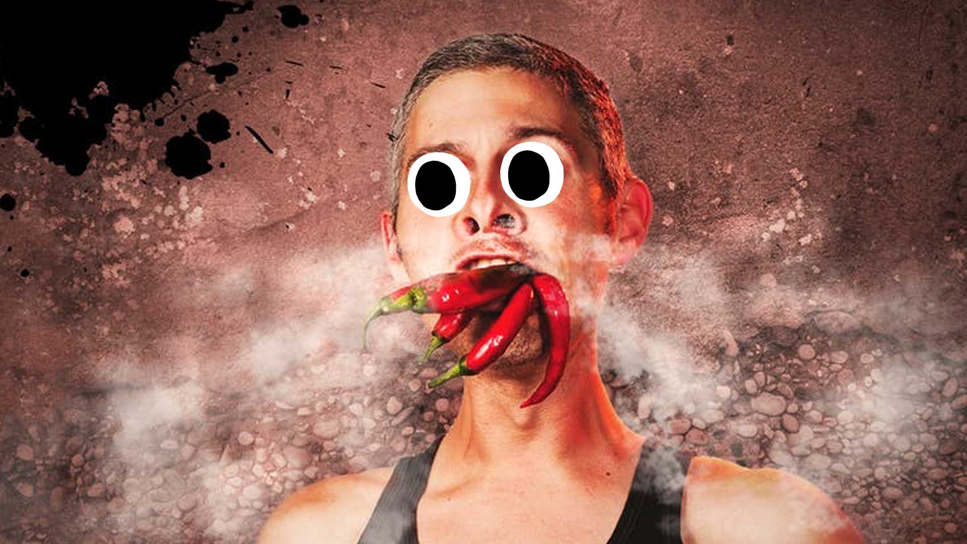 A man eating hot chilli peppers