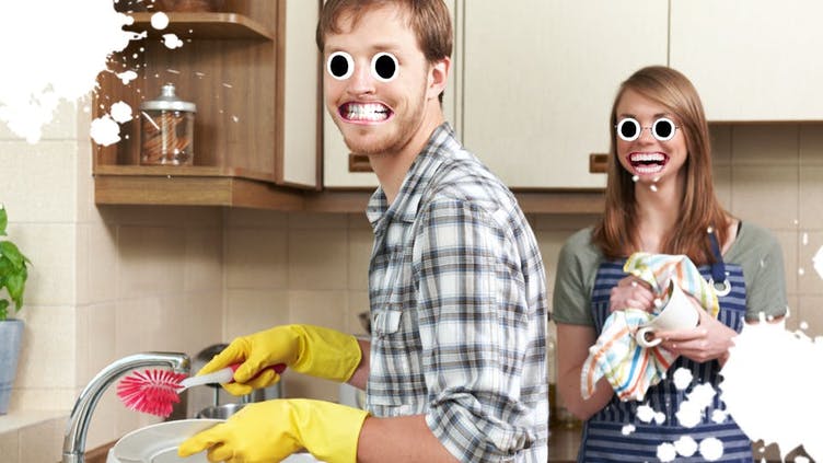 A man washing dishes