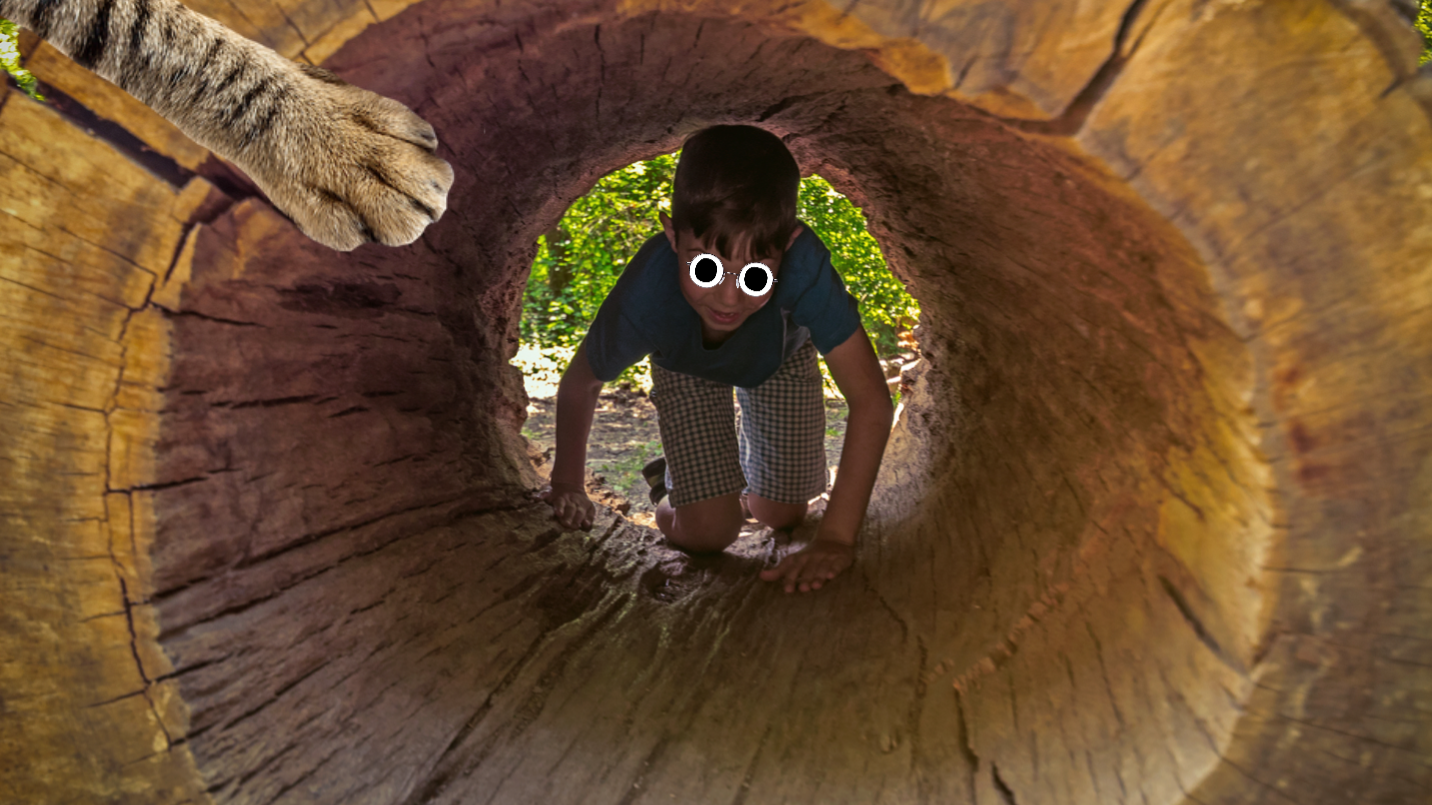 A forest school student in the middle of a big log