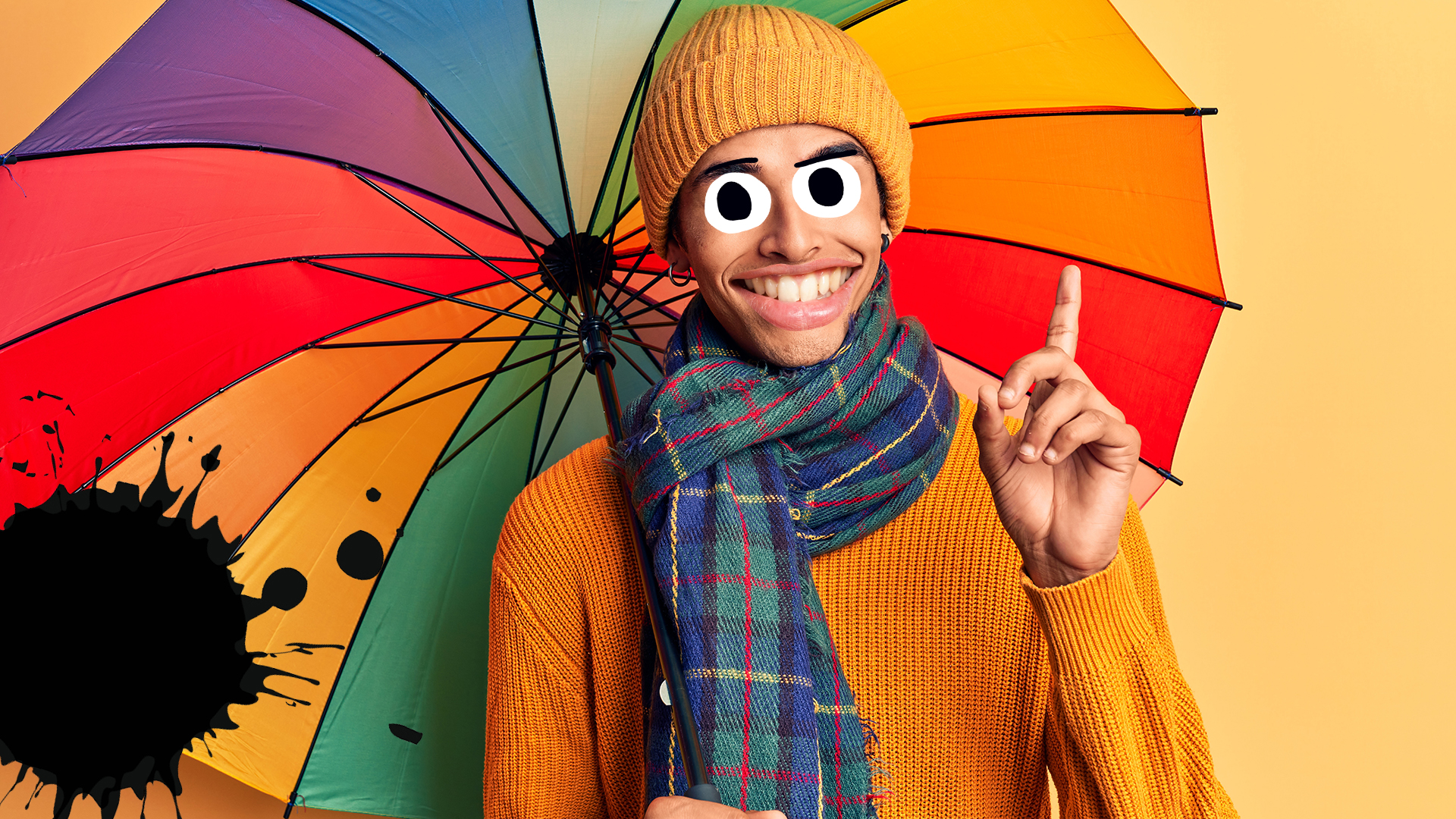 A man with a rainbow umbrella