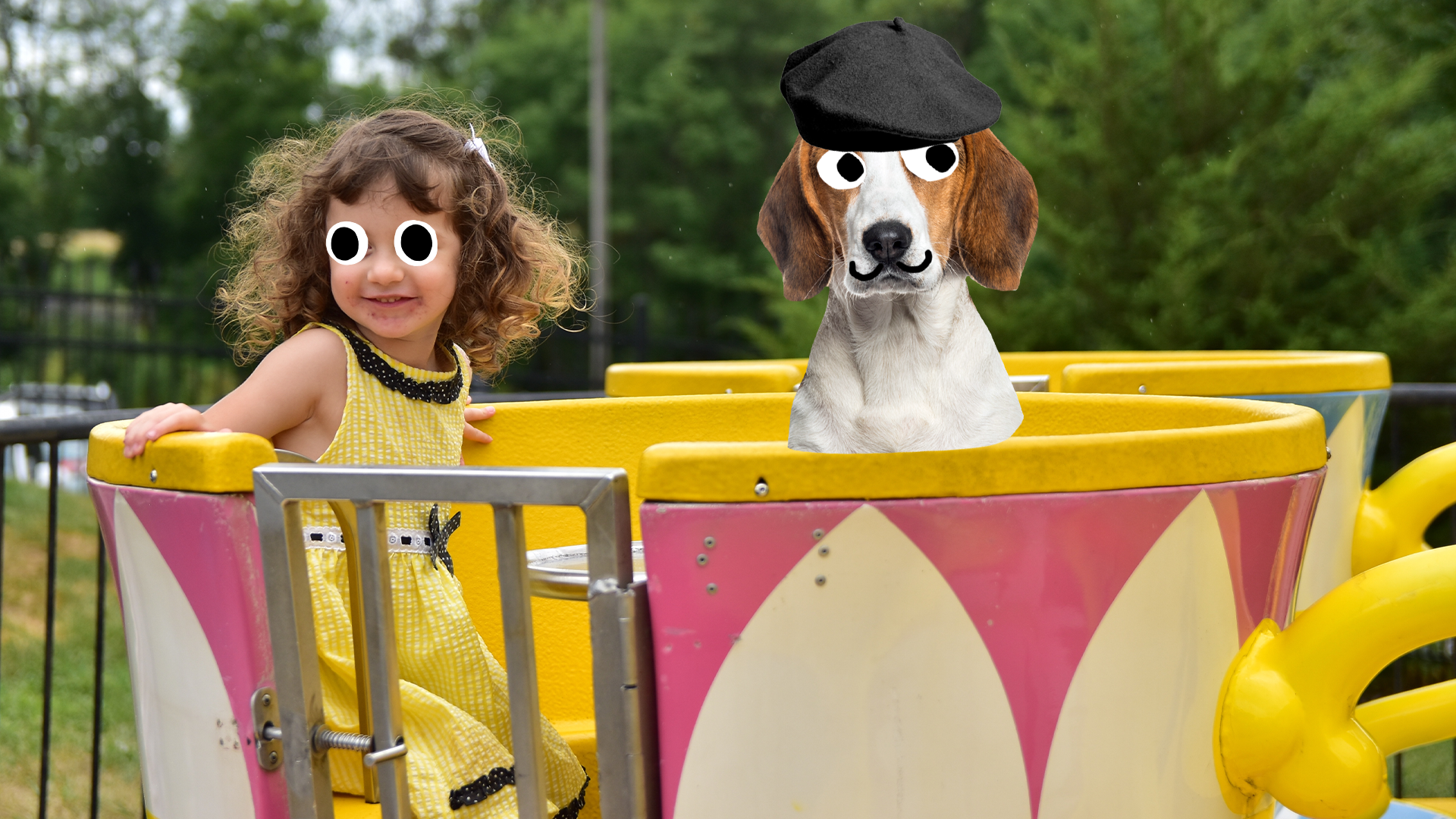 Girl on tea cup ride with french dog