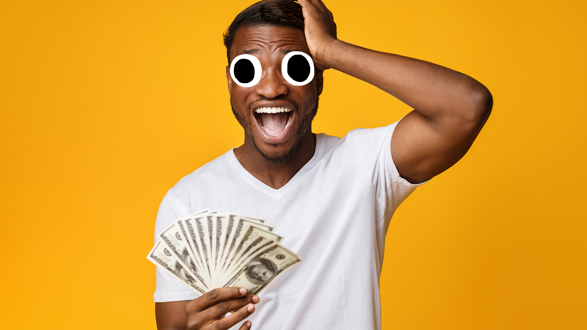 Man with money on yellow background
