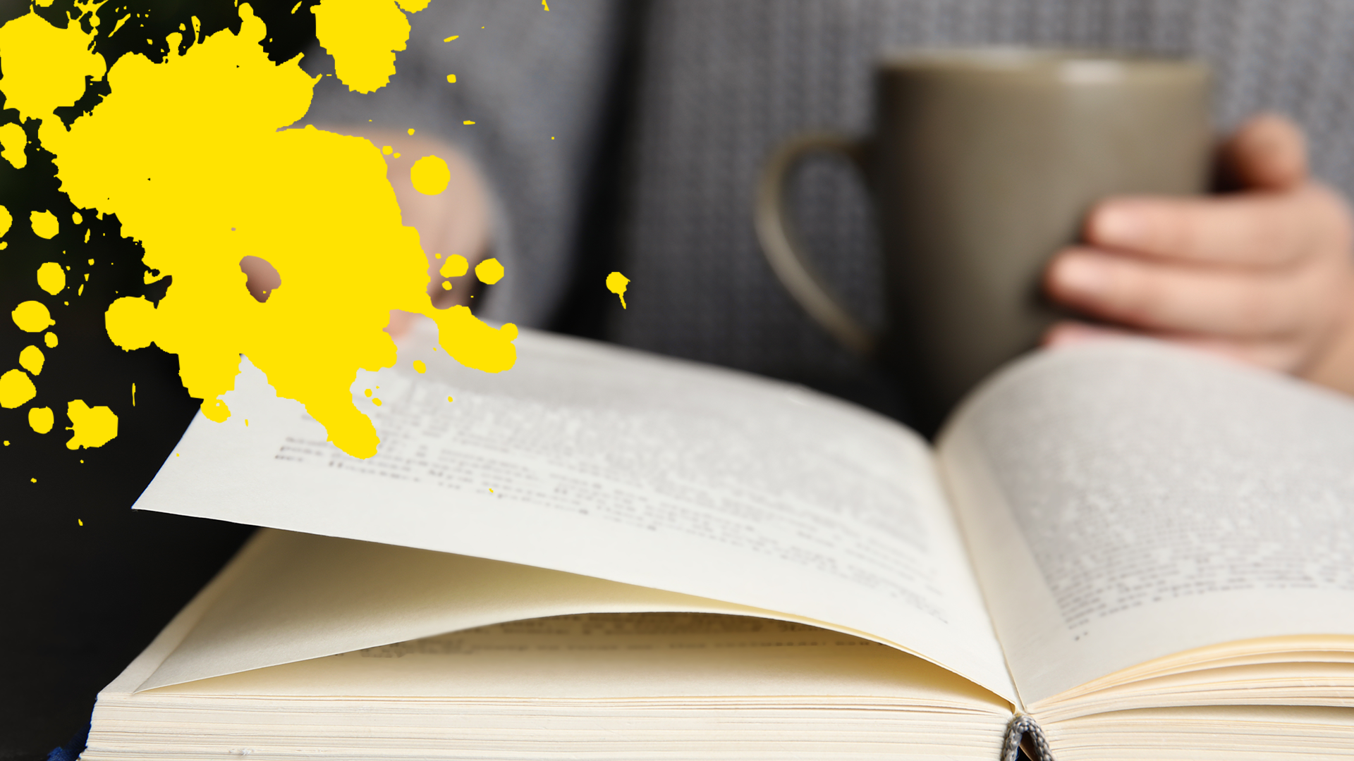 Person reading book with yellow splat