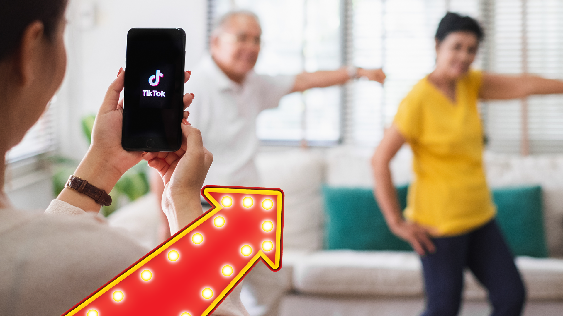 Light up arrow pointing to people doing a dance for TikTok video 