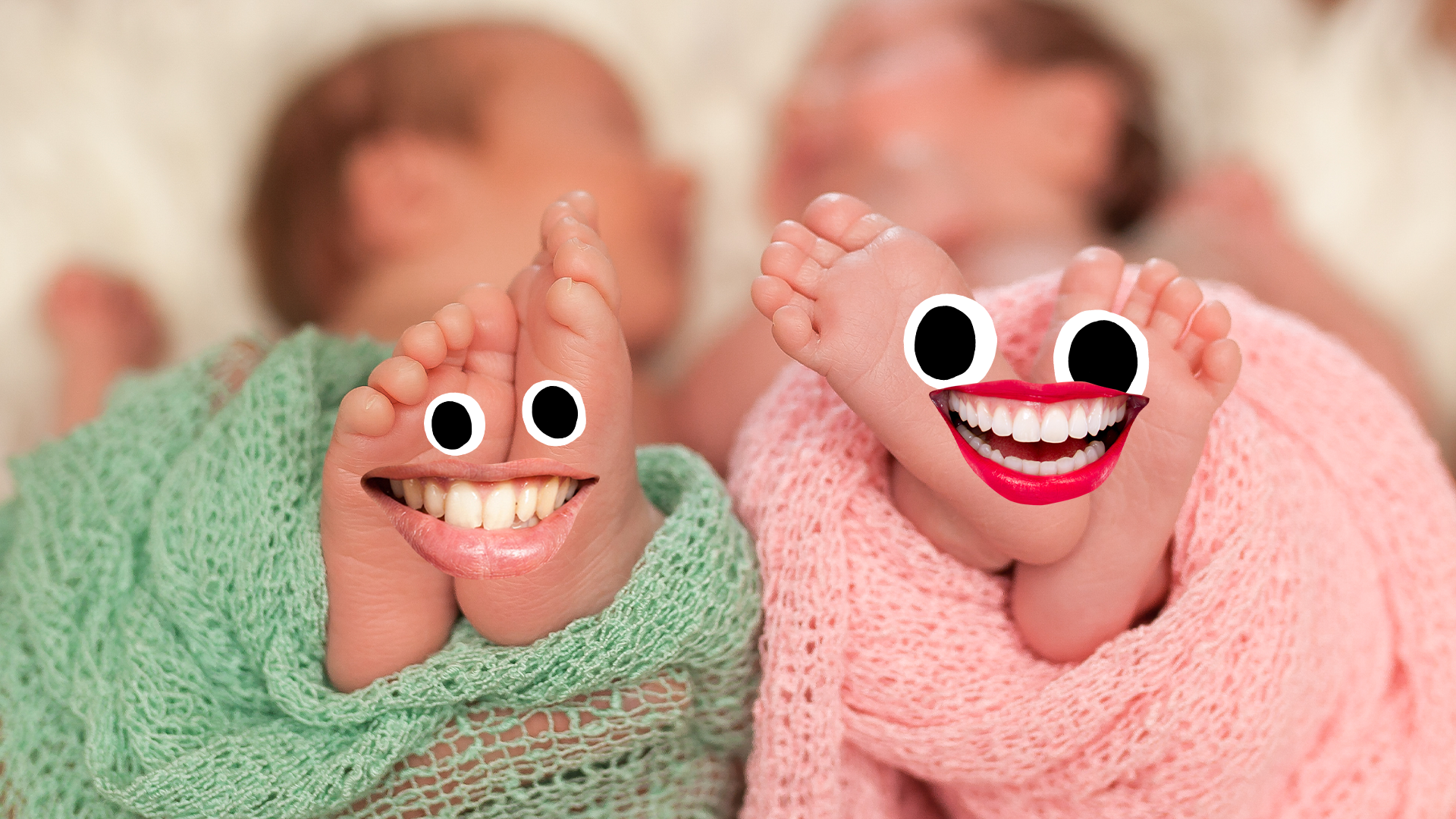 Two babies feet with smiley faces on them