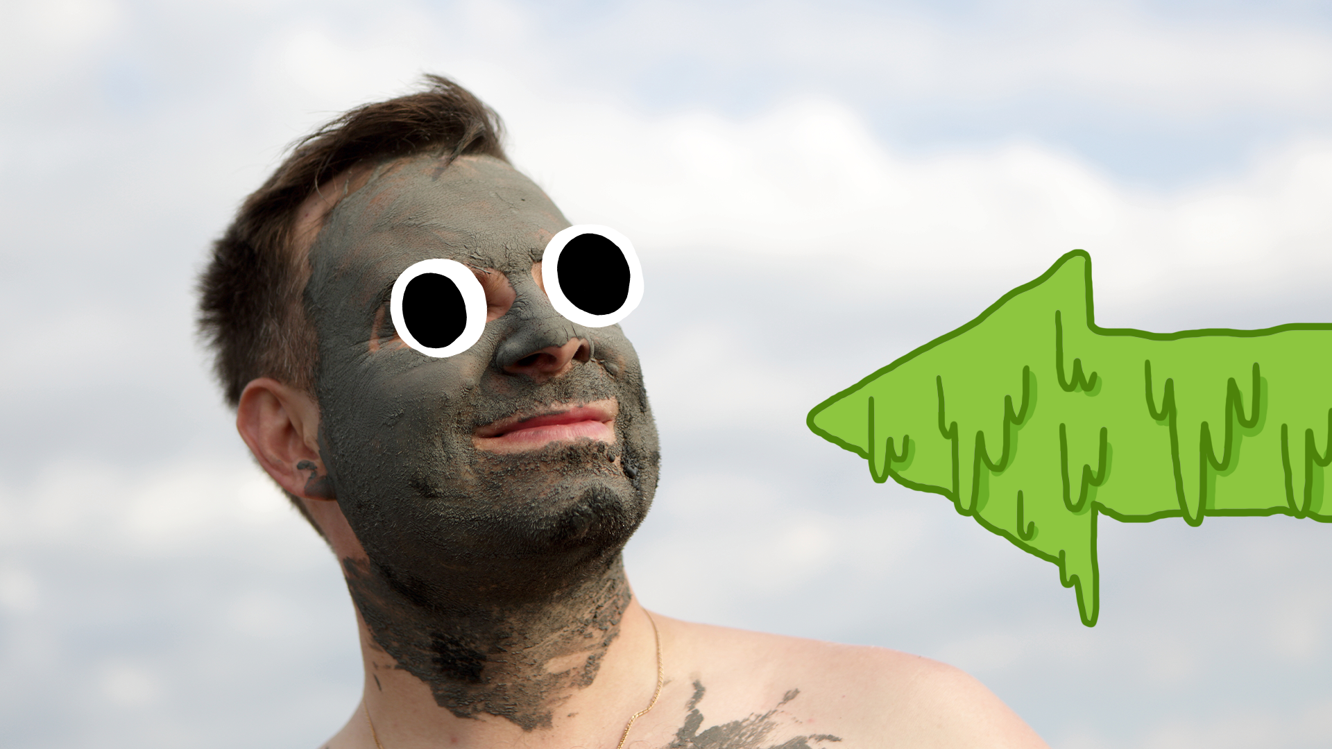 Man with mud on his face and green slimy arrow