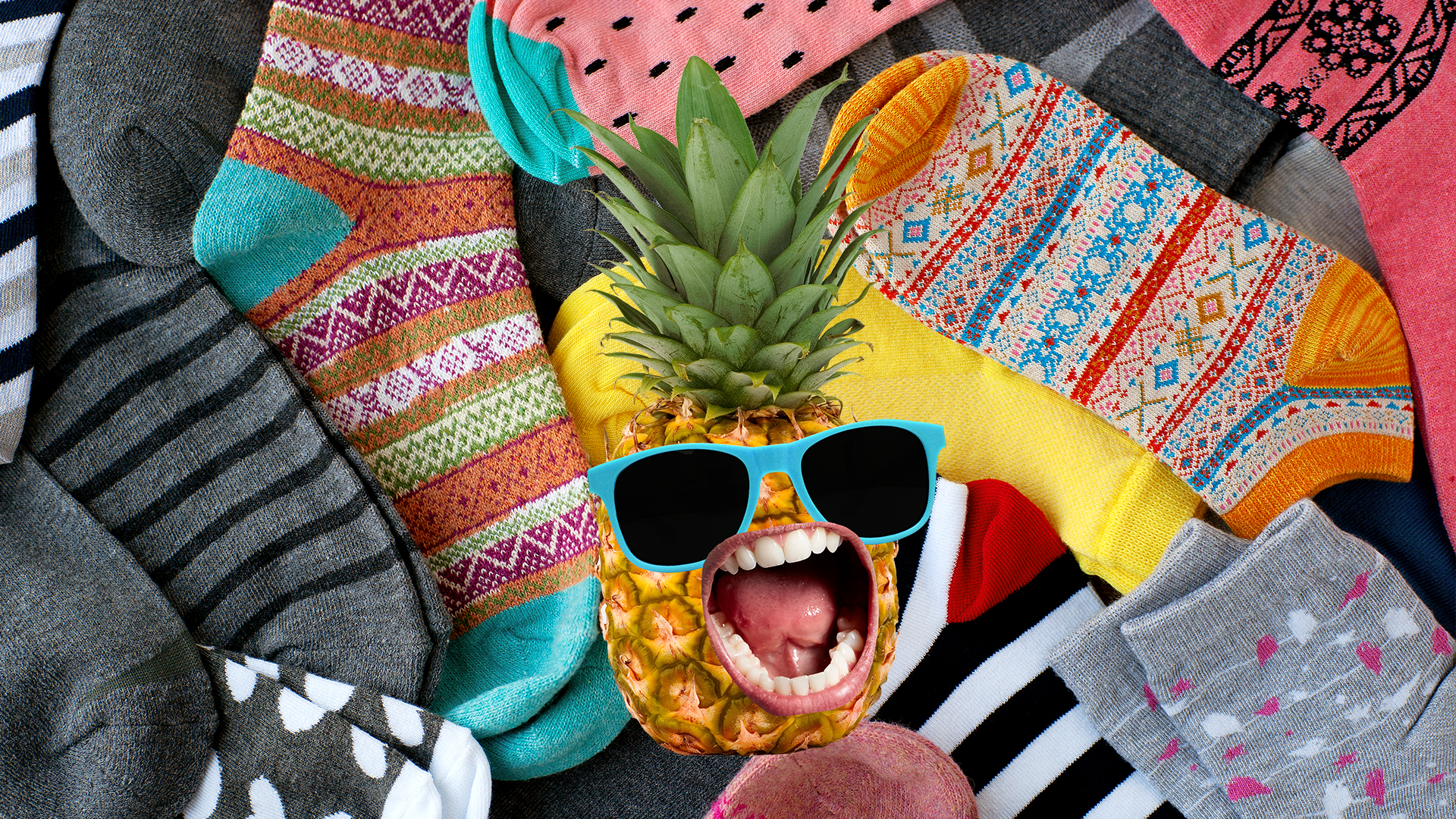 Screaming pineapple on socks background