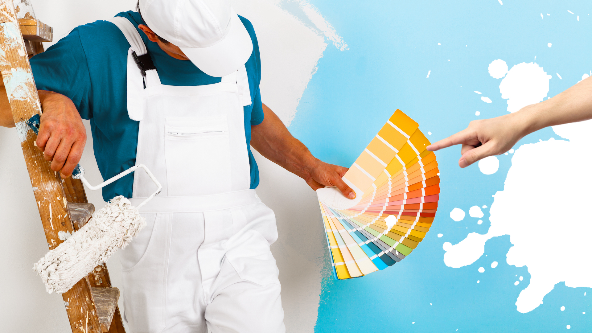 A painter holding a paint colour chart