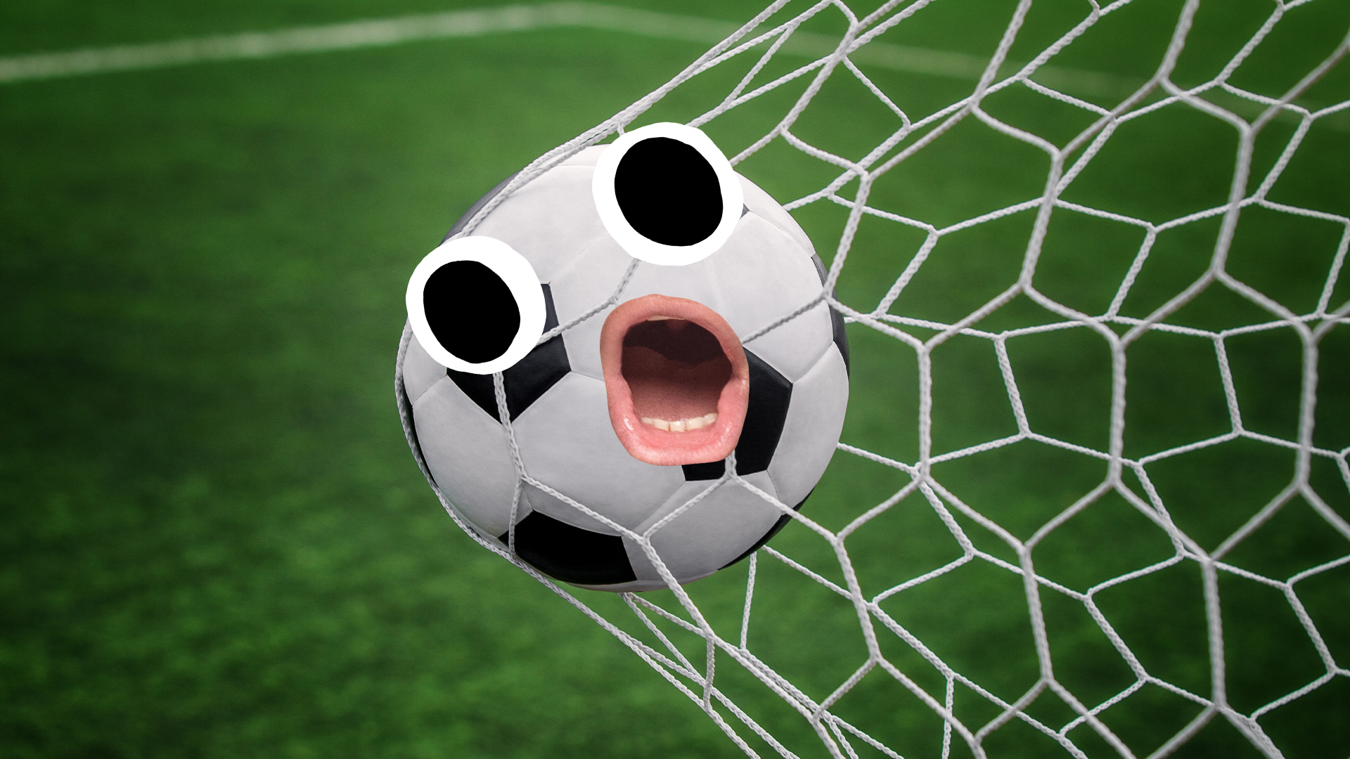 Football with face in goal net