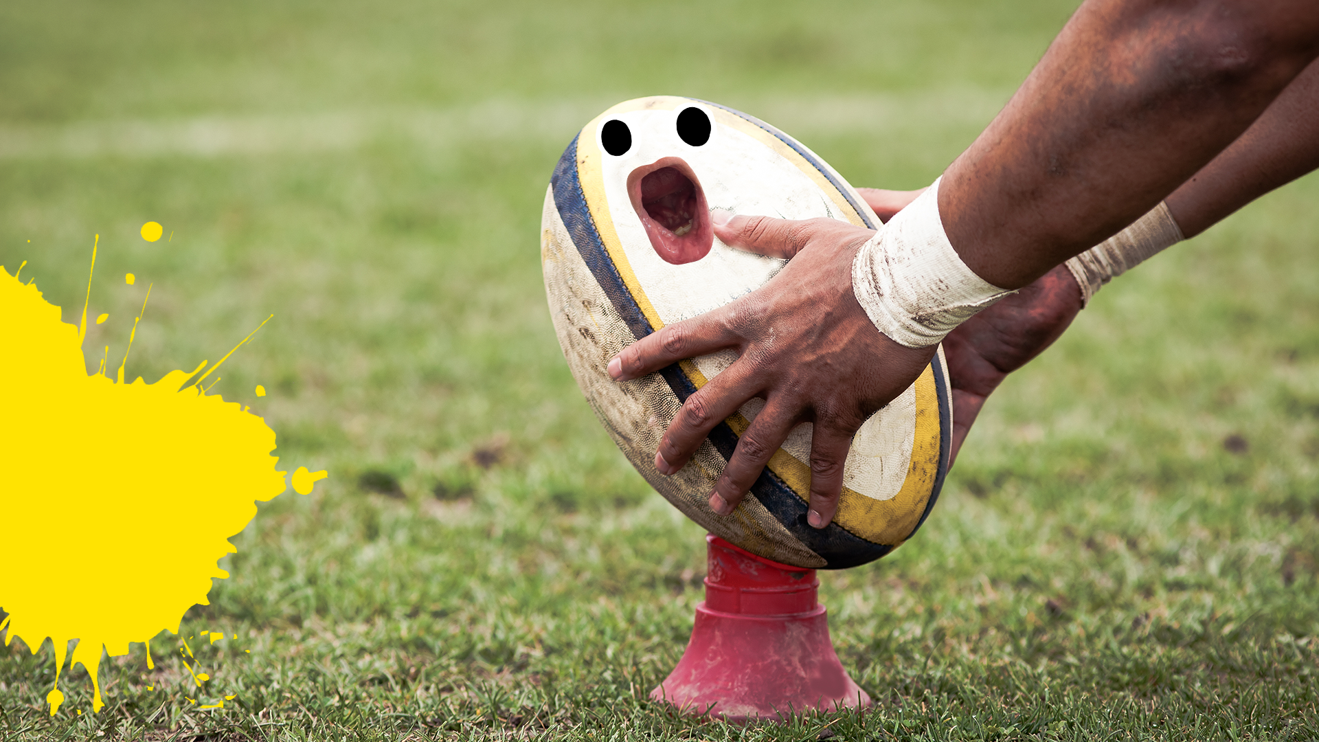 Hands placing rugby ball with face on grass with yellow splat