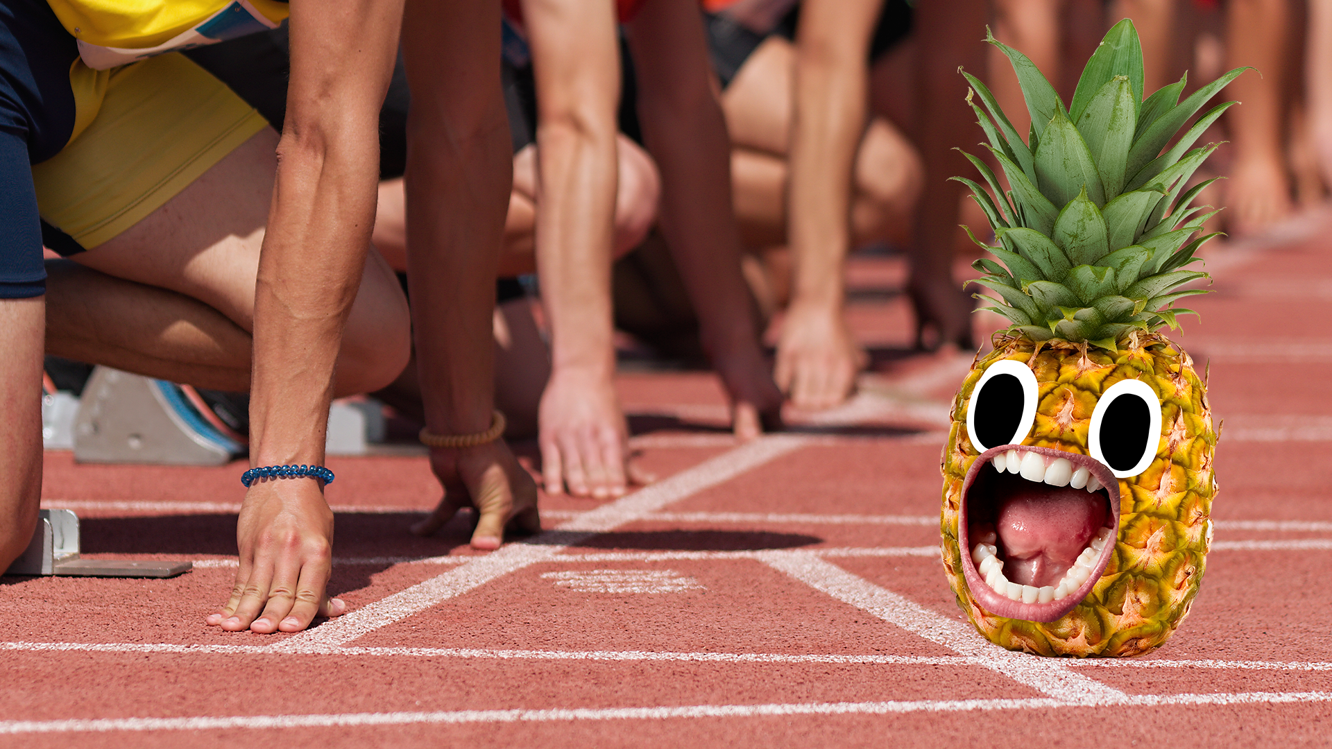 Runners at start line and screaming pineapple